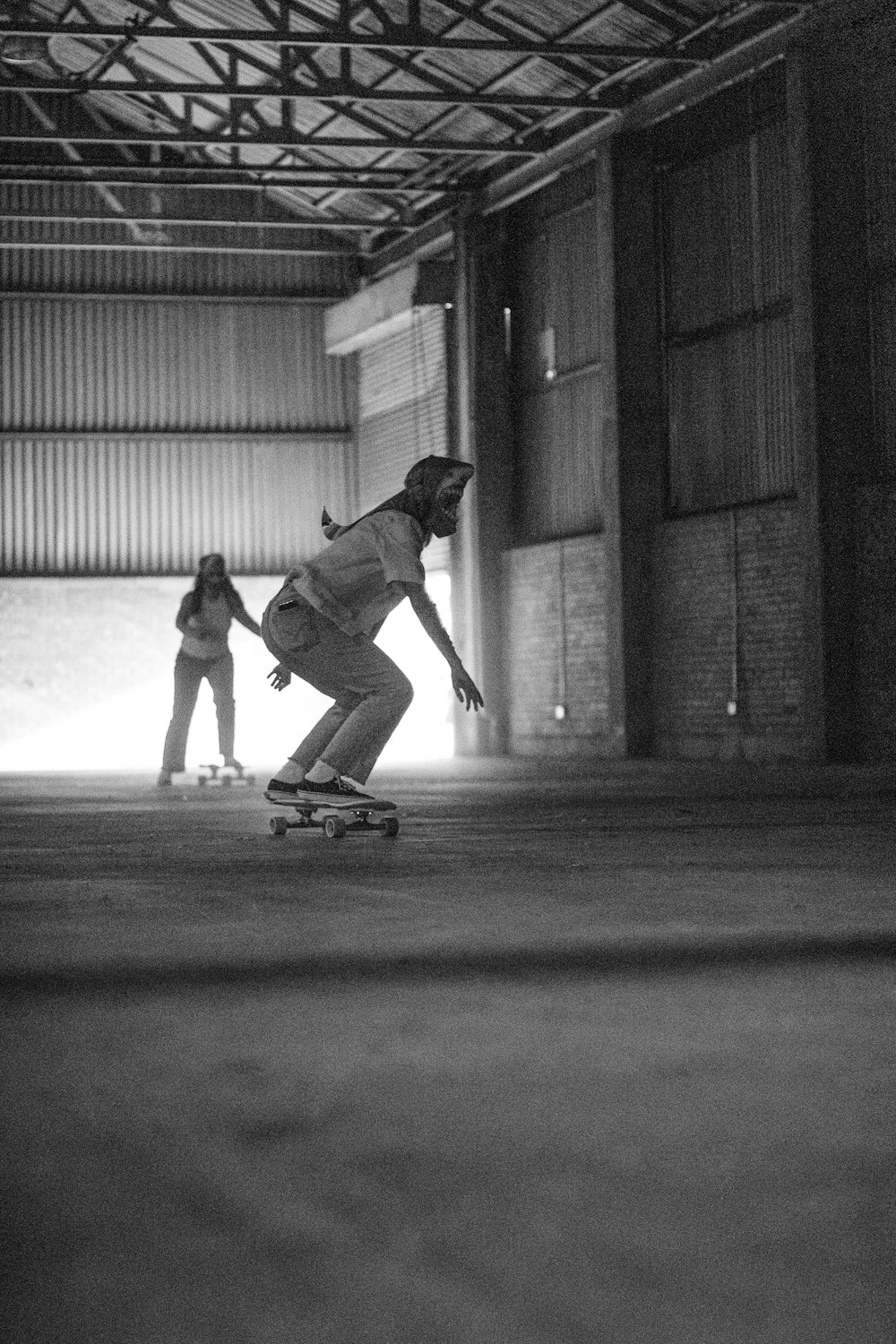 a couple of people that are on a skateboard