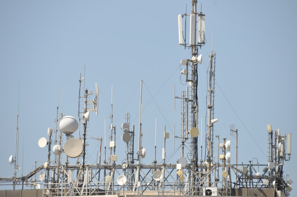 a large array of cell phones on top of a building