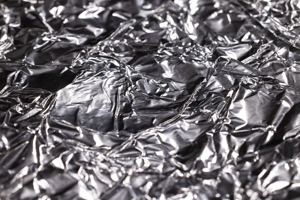 a black and white photo of tin foil