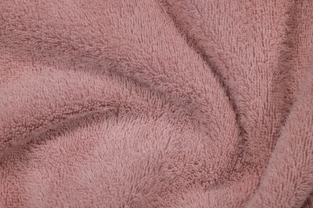 a close up view of a pink blanket