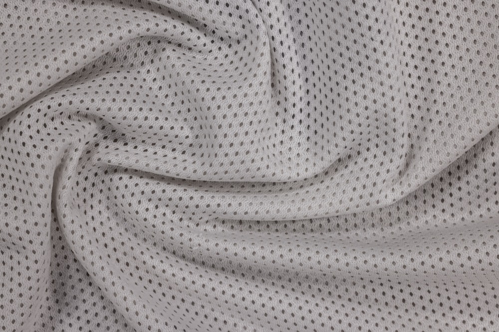 a close up view of a white fabric