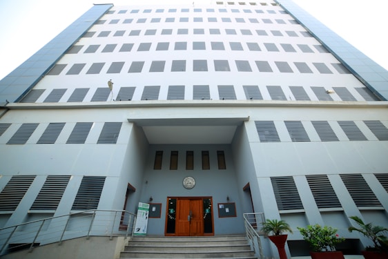 A modern office building of Prime Estates with a welcoming entrance in Dwarka.