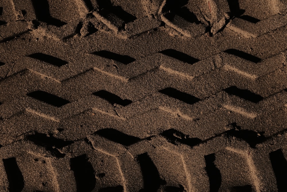 a close up of a tire tread on the ground