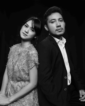 a man and a woman standing next to each other