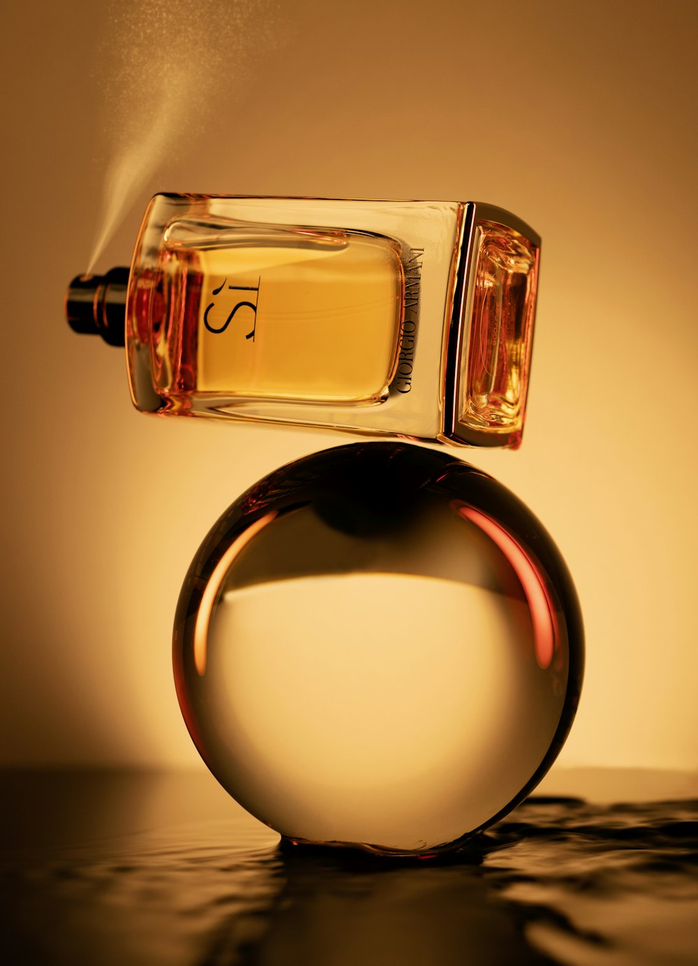 a bottle of perfume sitting on top of a table