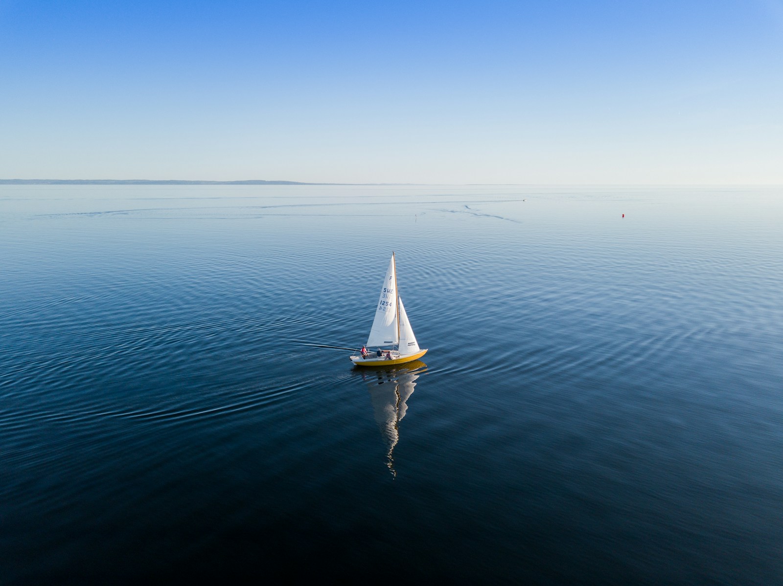 Sea and sailing boat, a thematic illustration
