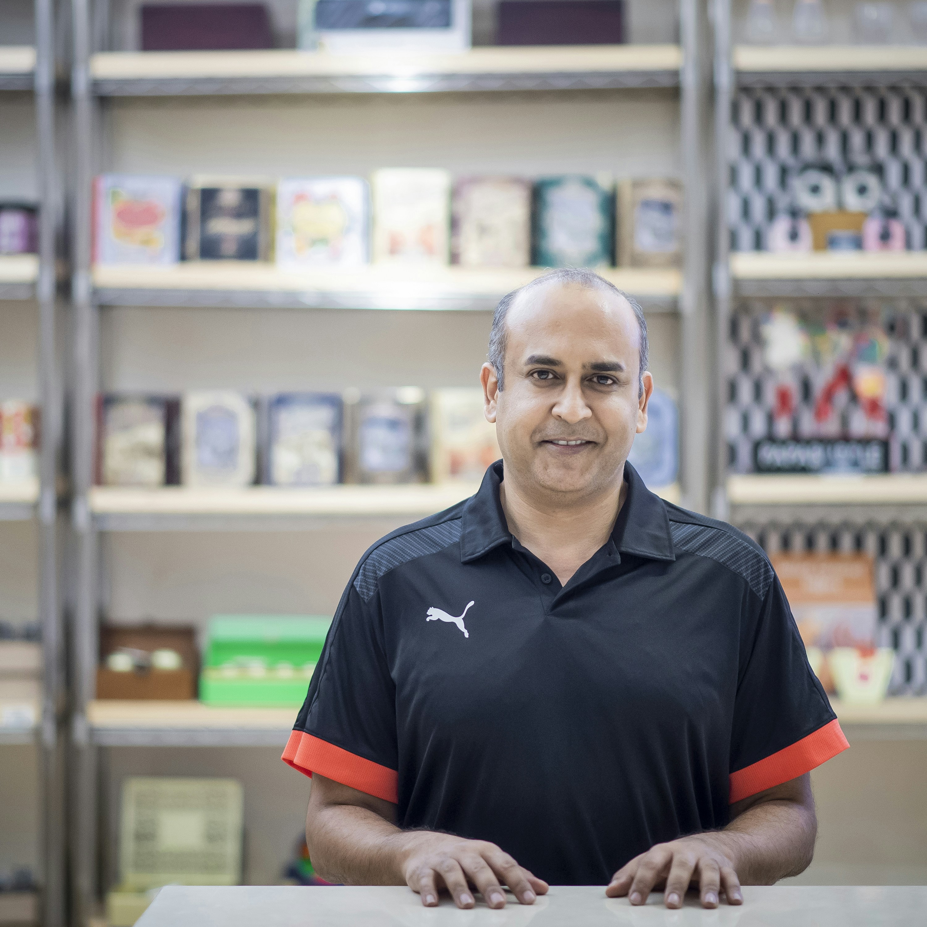 RacketShop UK seller profile photo, smiling man in sports gear