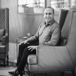 A landlord relaxing at home, stress-free while minor repairs are handled.