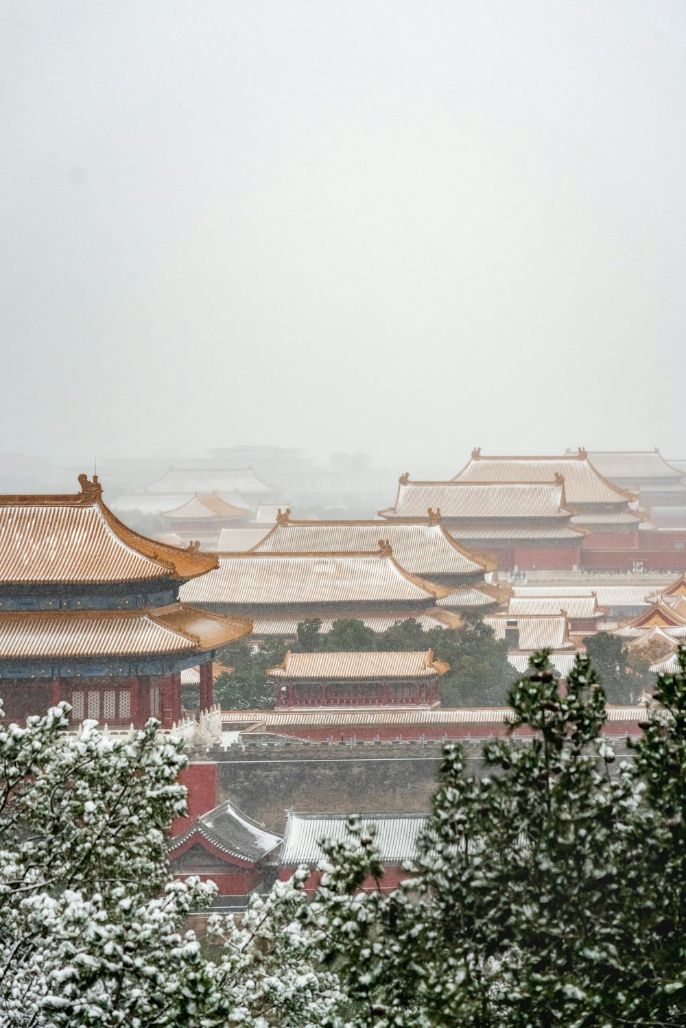 a view of a snow covered city from a distance