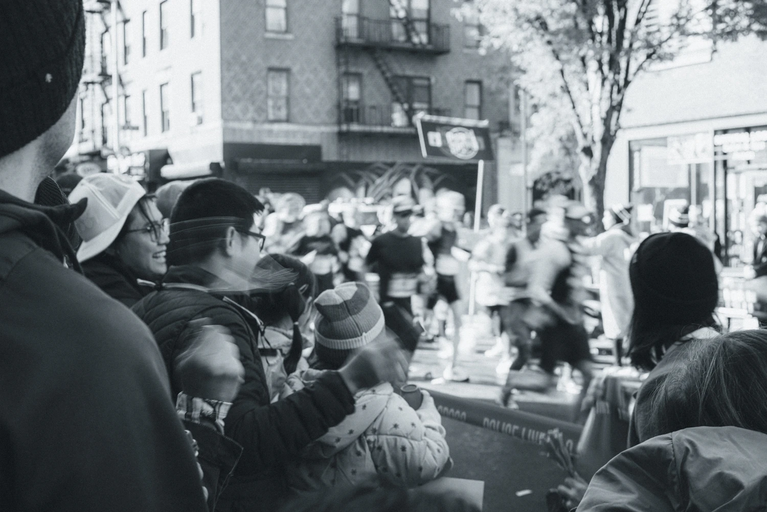 A busy city street is a public place where photographing people is generally lawful in Australia, though specific offences and venue rules still apply.