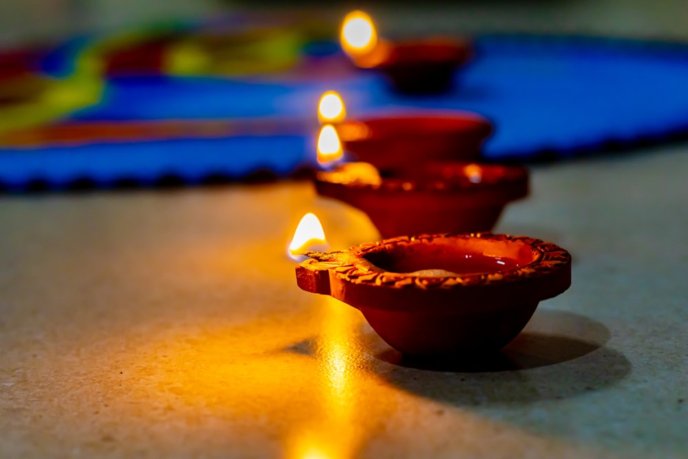 a group of small candles sitting on top of a table