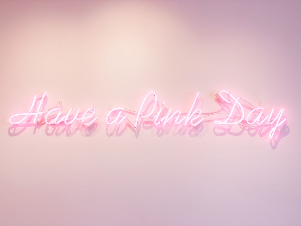 a pink neon sign that says have a pink day