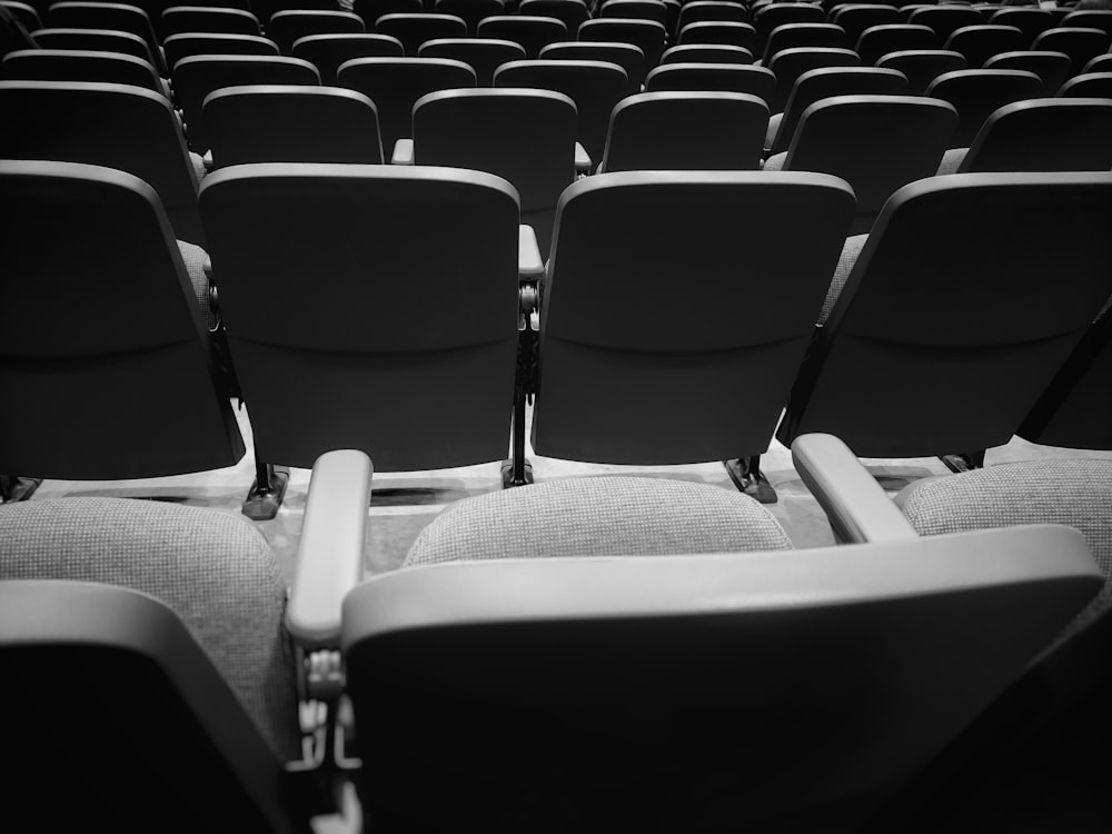 black and white photograph of a row of empty seats