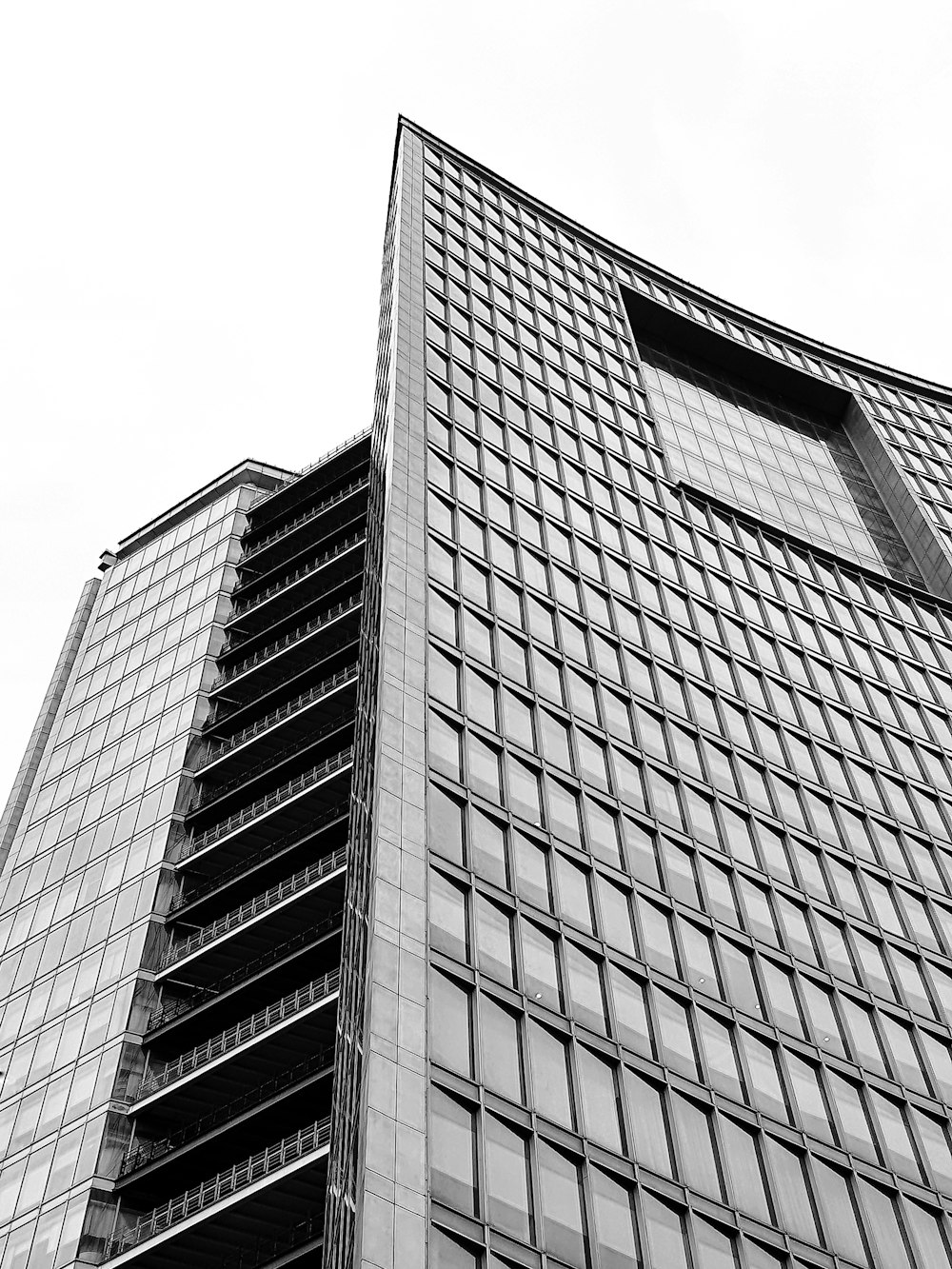 a black and white photo of a tall building