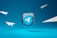 A prominent Telegram app logo is set in the center against a vibrant blue background, surrounded by four minimalist paper airplane illustrations, suggesting themes of communication and connectivity.