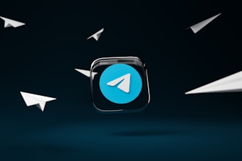 a blue button with a white arrow on it