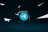 a blue button with a white arrow on it