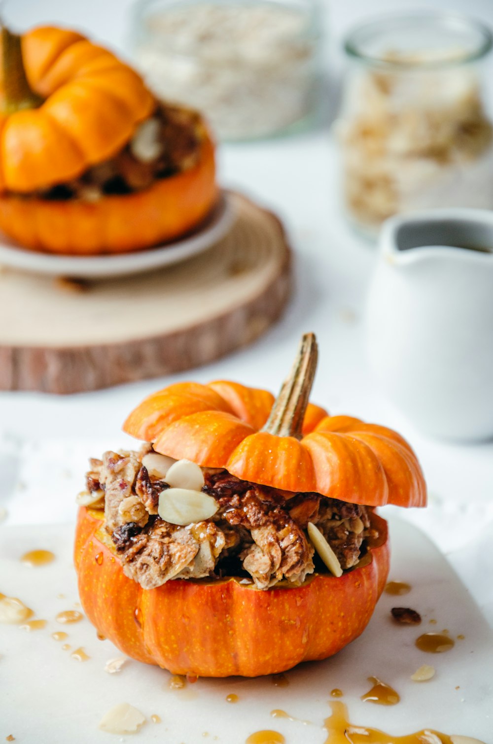a close up of a pumpkin with granola in it