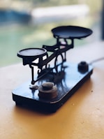 A sleek electronic balance displaying an exact measurement on its digital screen.