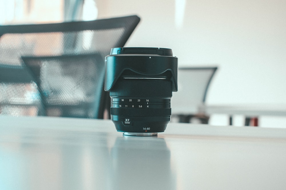 a camera lens sitting on top of a table