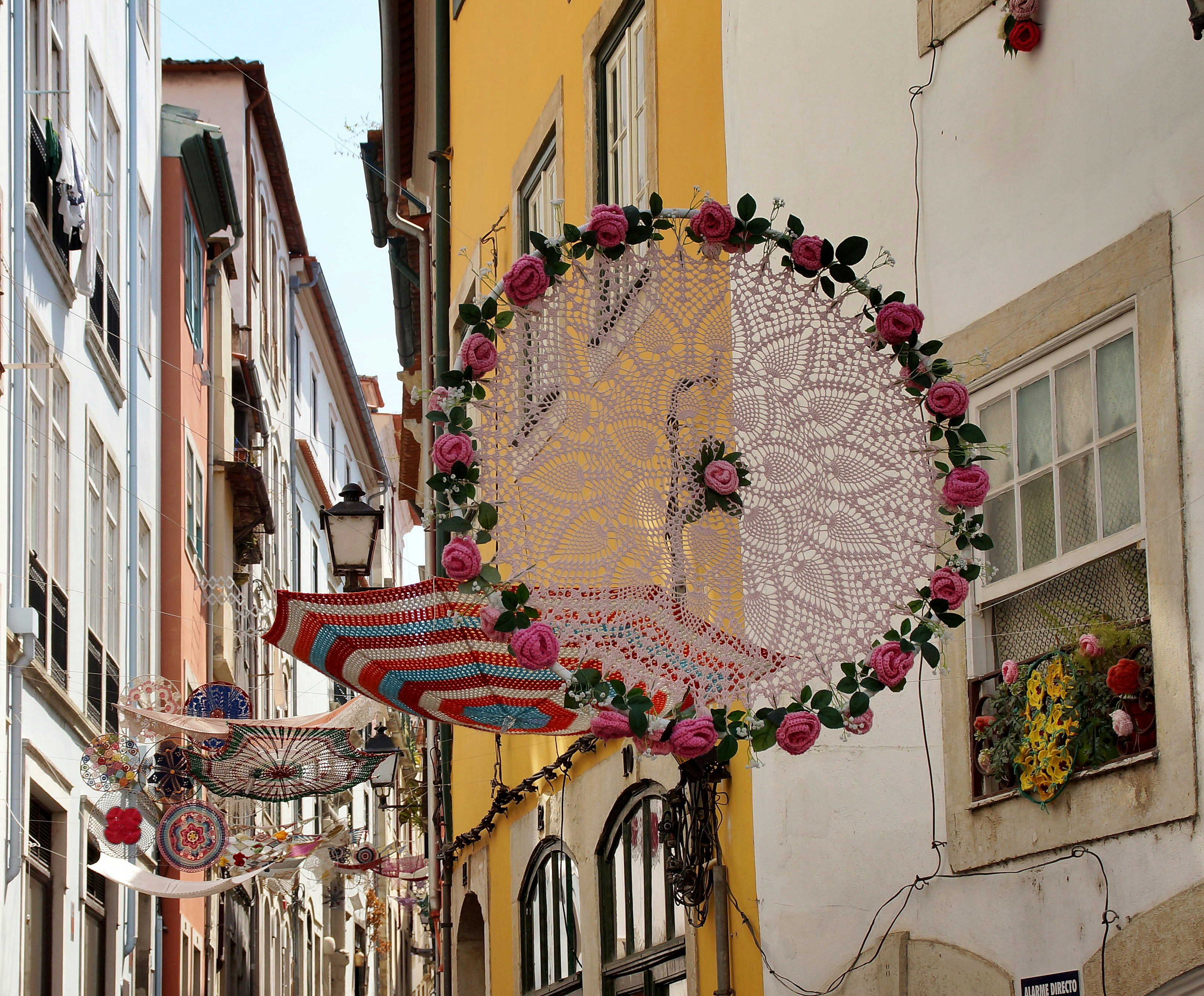an umbrella is hanging on the side of a building