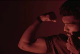 Close-up of a muscle flex during an intense workout session.