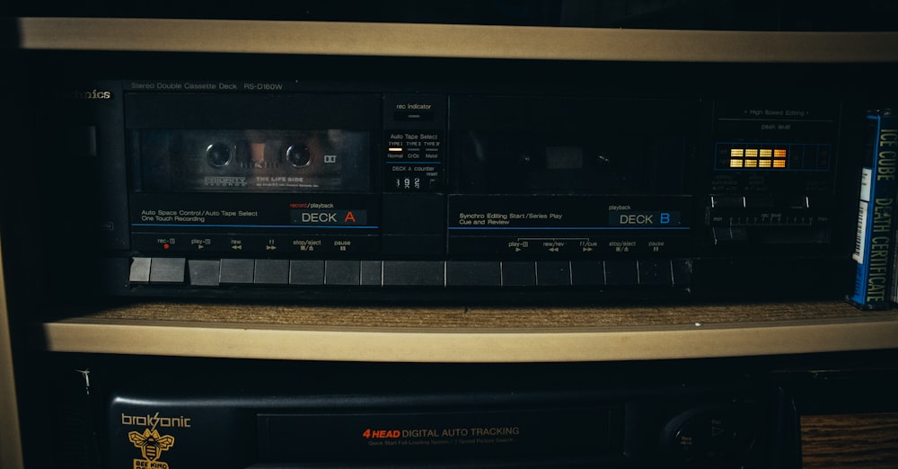 a close up of a radio on a shelf