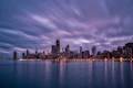 a view of a city at night from across the water