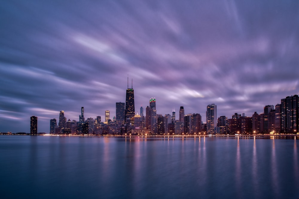 a view of a city at night from across the water