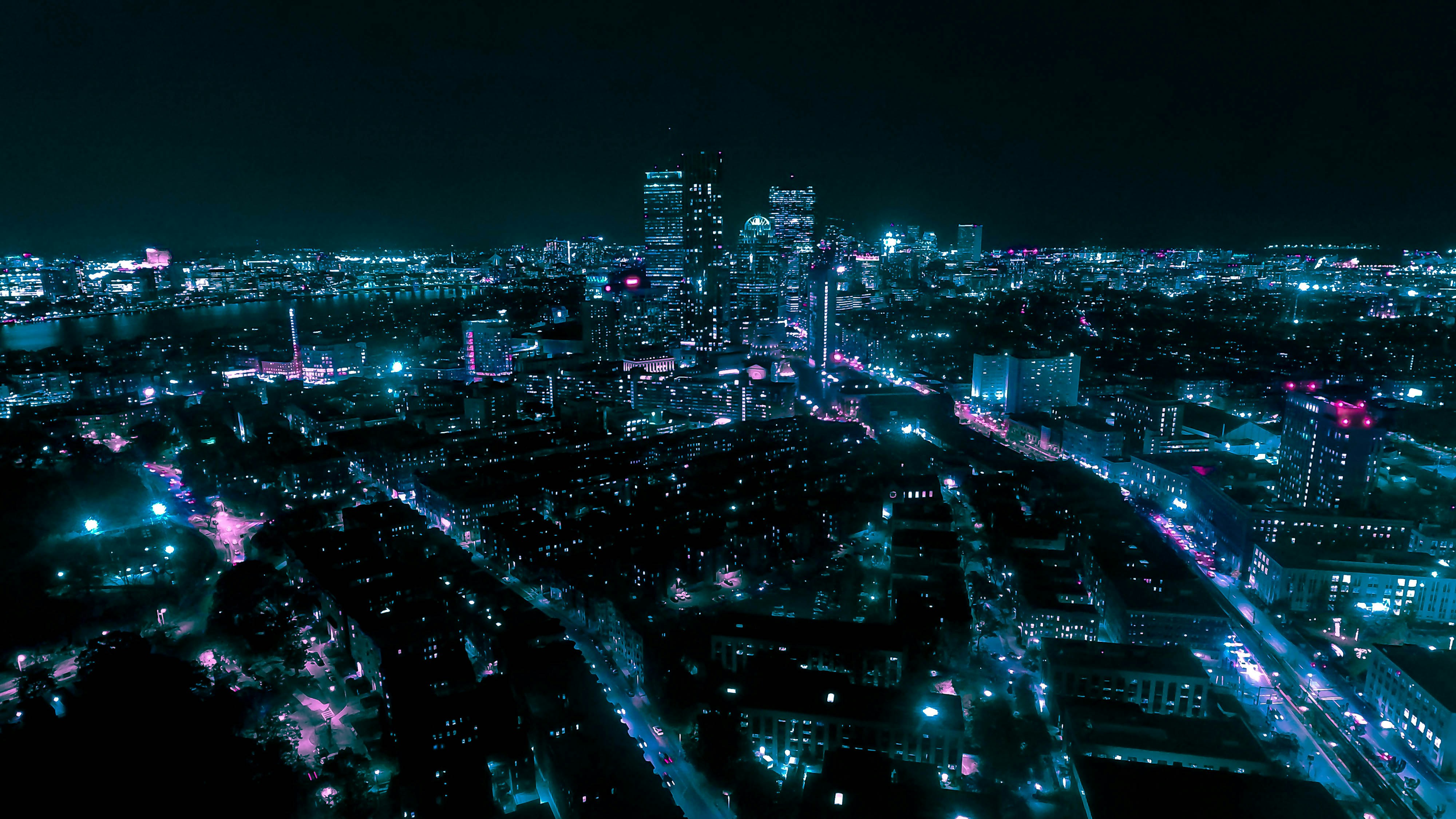 an aerial view of a city at night