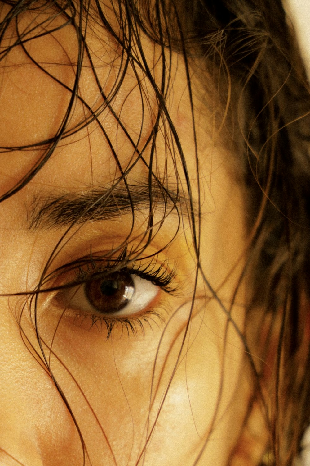 a close up of a person with wet hair