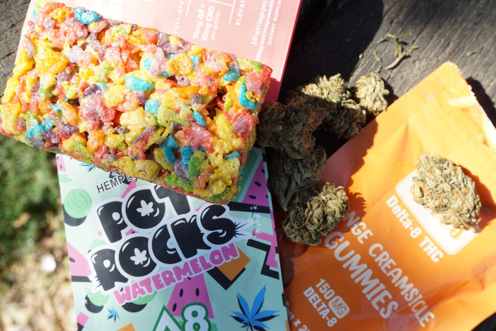 a bag of cereal and a bag of weed sitting on a table