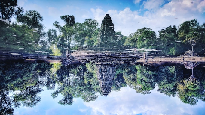 A serene landscape of Sri Lanka showcasing lush greenery and ancient ruins.