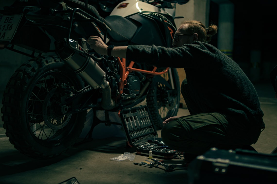 Motorcycle mechanic at work