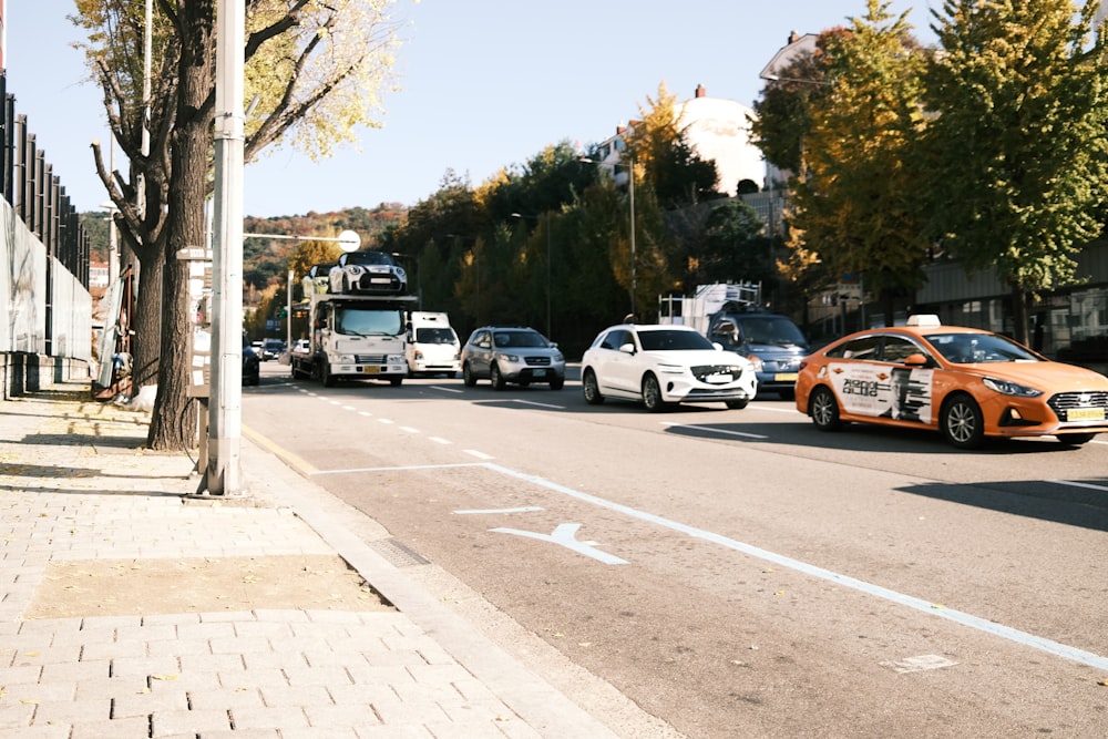 a couple of cars that are sitting in the street