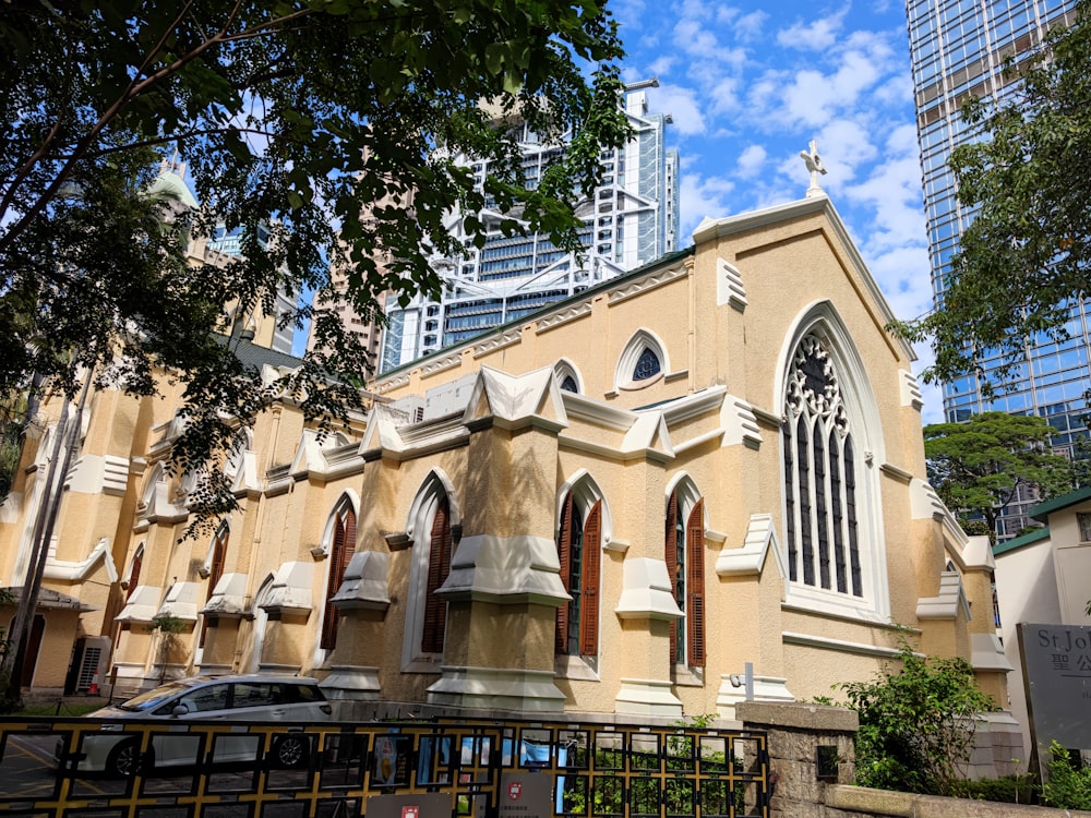 a large church with a tall tower in the background