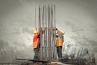 two men working on a construction site
