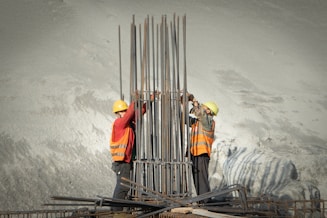 two men working on a construction site