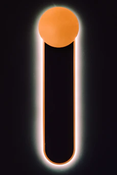 Round filter buttons glowing softly in gold on a dark, elegant interface