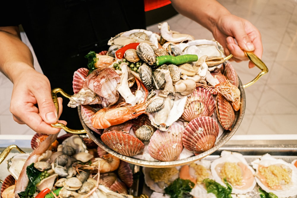 a person cutting food on a plate