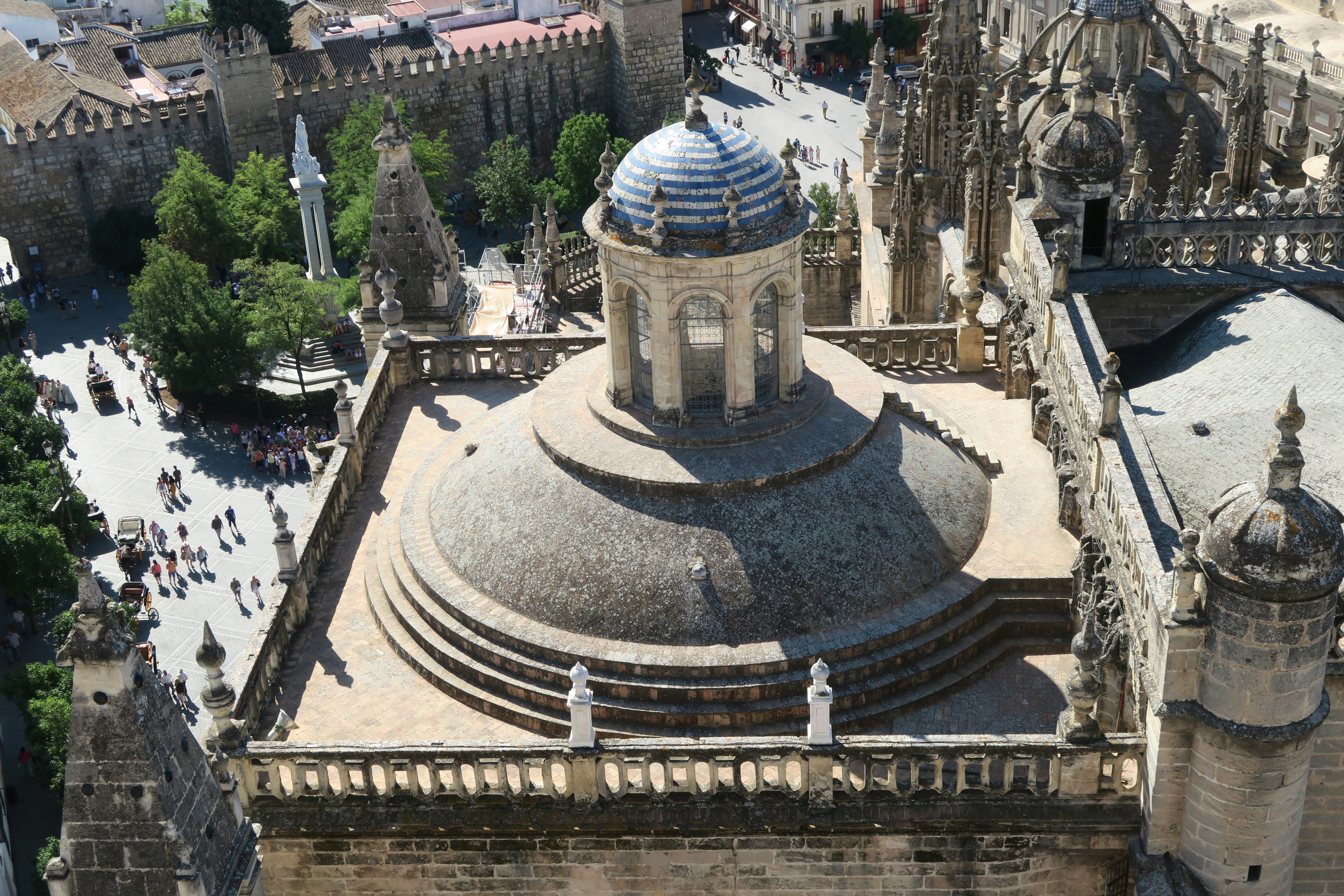 an aerial view of a large building with a clock tower