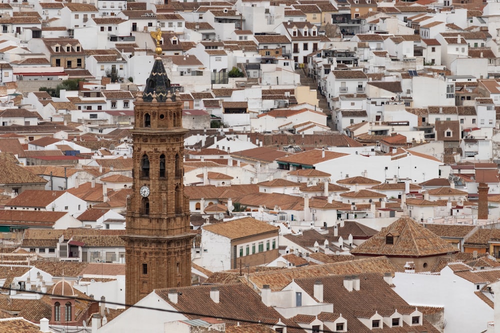 a tall clock tower towering over a city