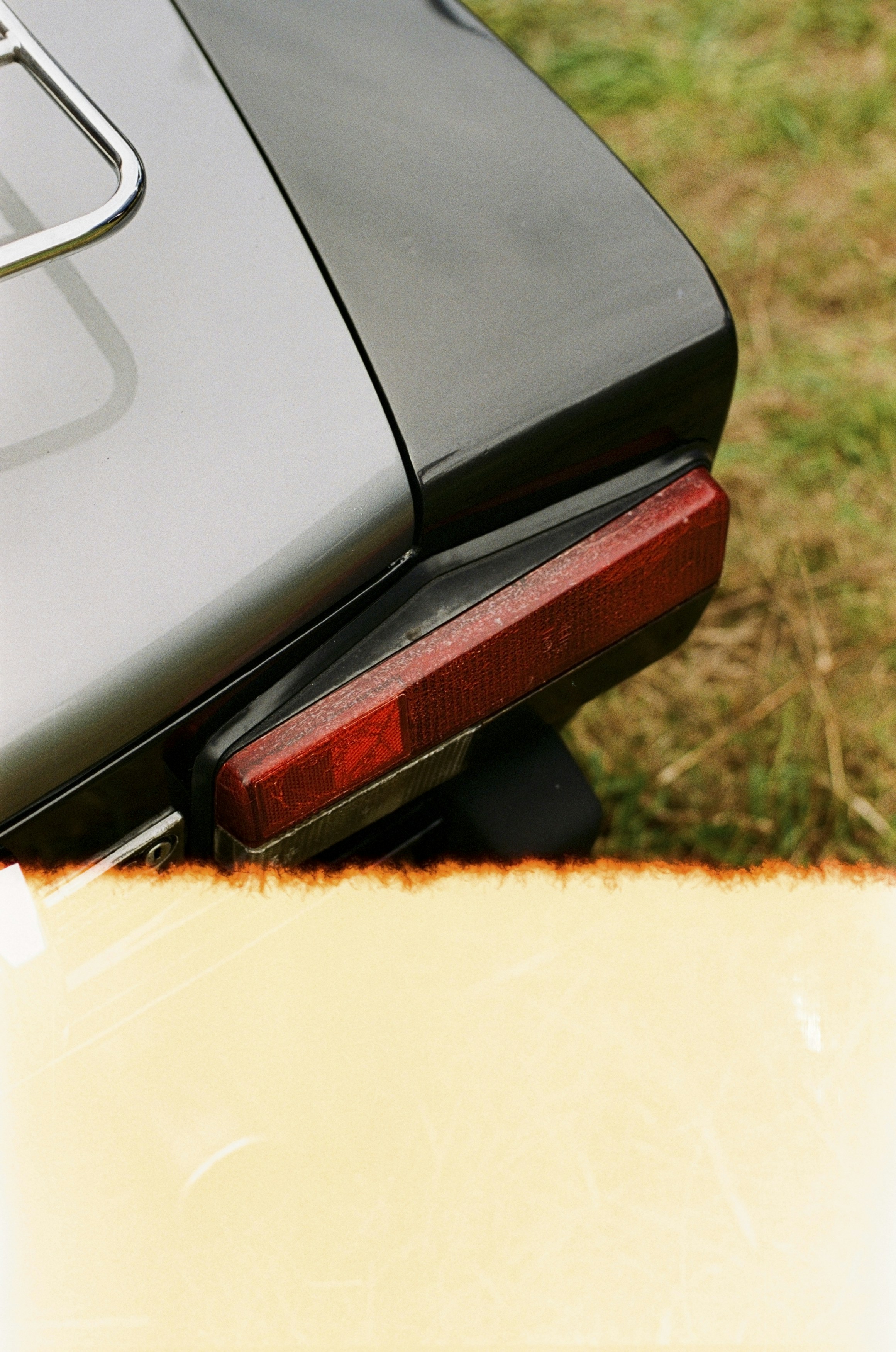 a close up of the tail light of a car