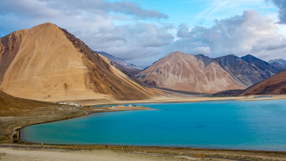 a large body of water surrounded by mountains