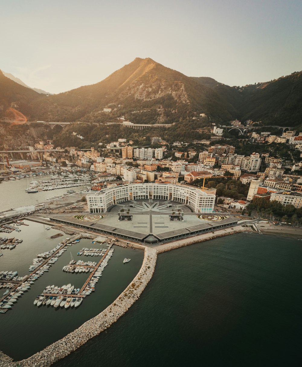 an aerial view of a marina with boats in the water