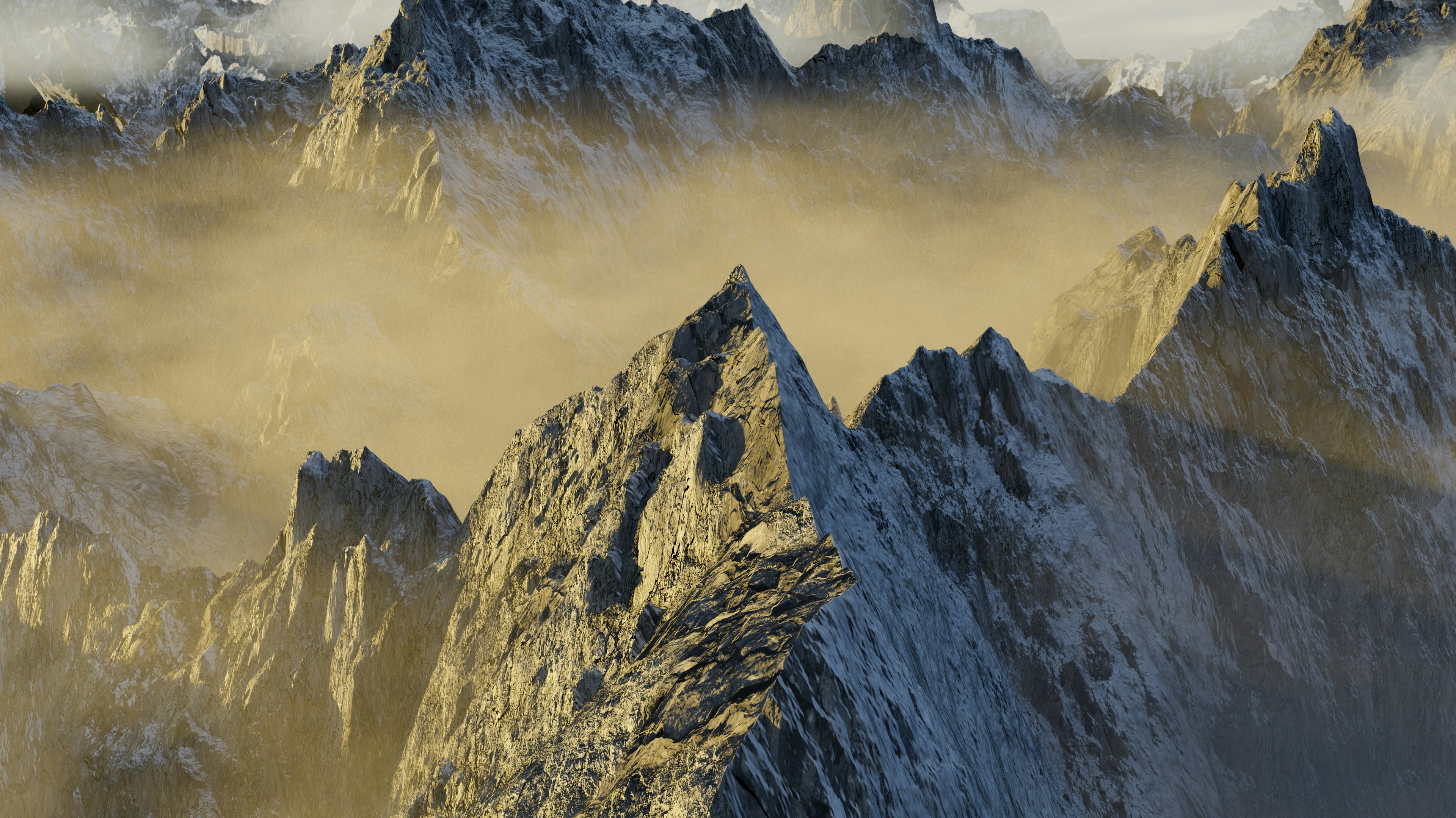 Jagged mountain peaks shrouded in mist at sunrise