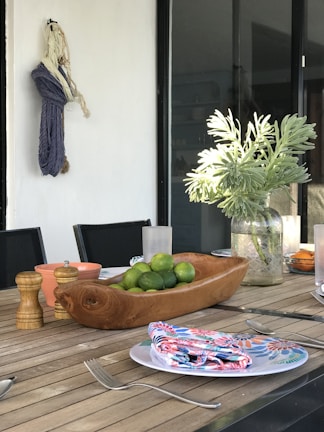 An inviting table set for a Thai-inspired meal with decorative elements.