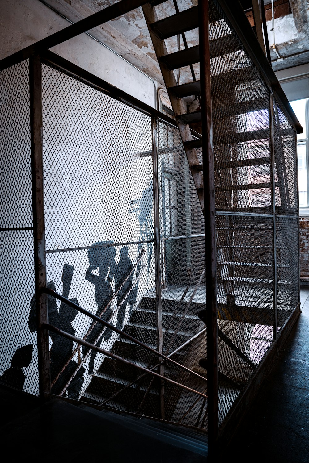 a group of people walking up a set of stairs