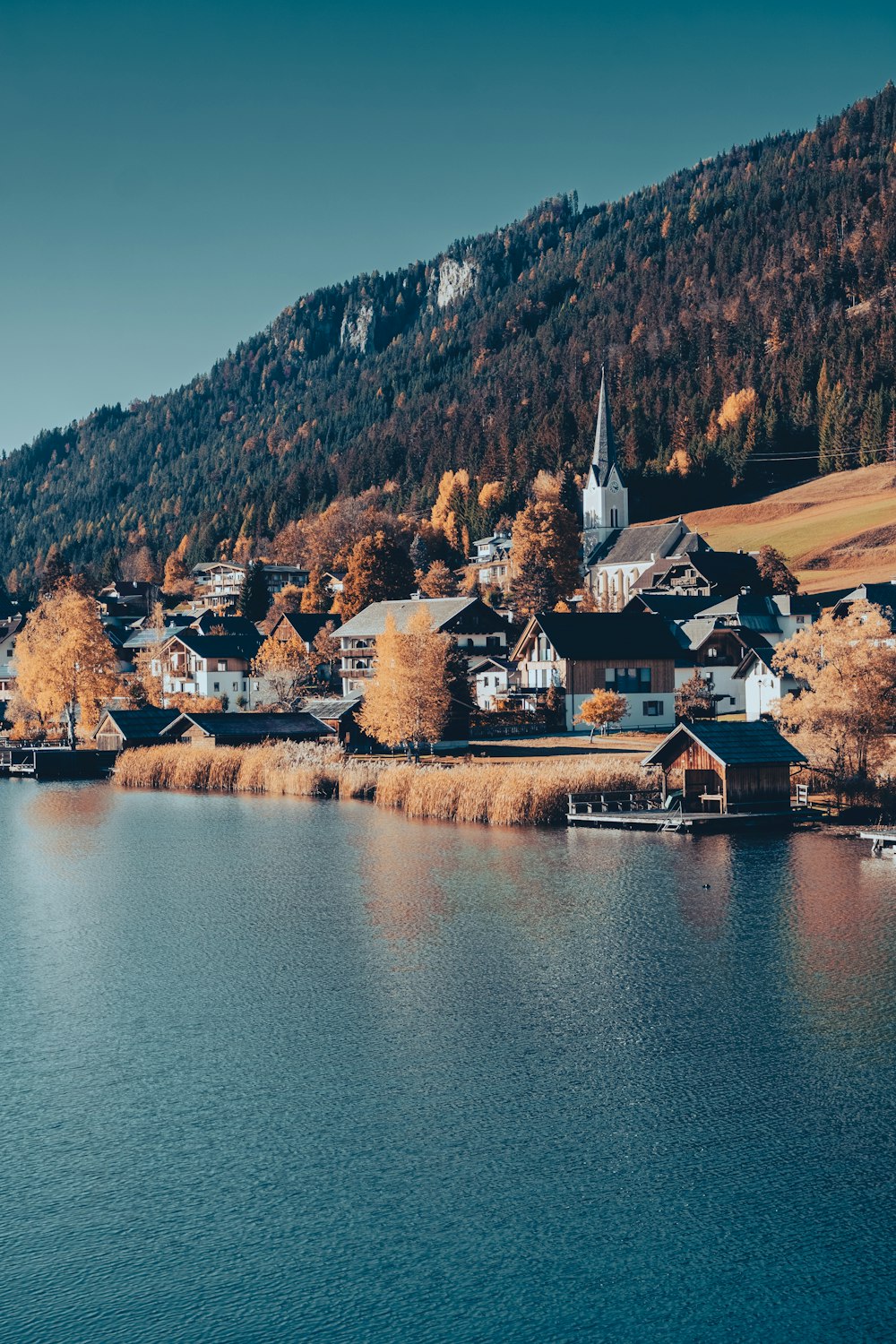 a small village on the shore of a lake