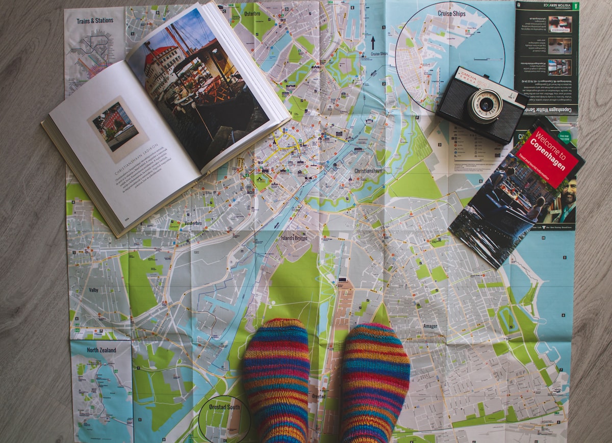 a map with a person's feet on top of it